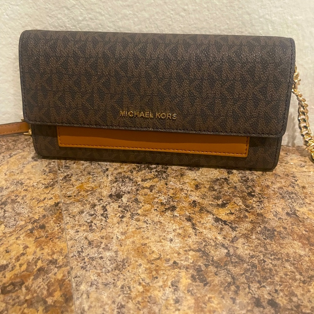 Michael Kors wallet on a chain crossbody bag